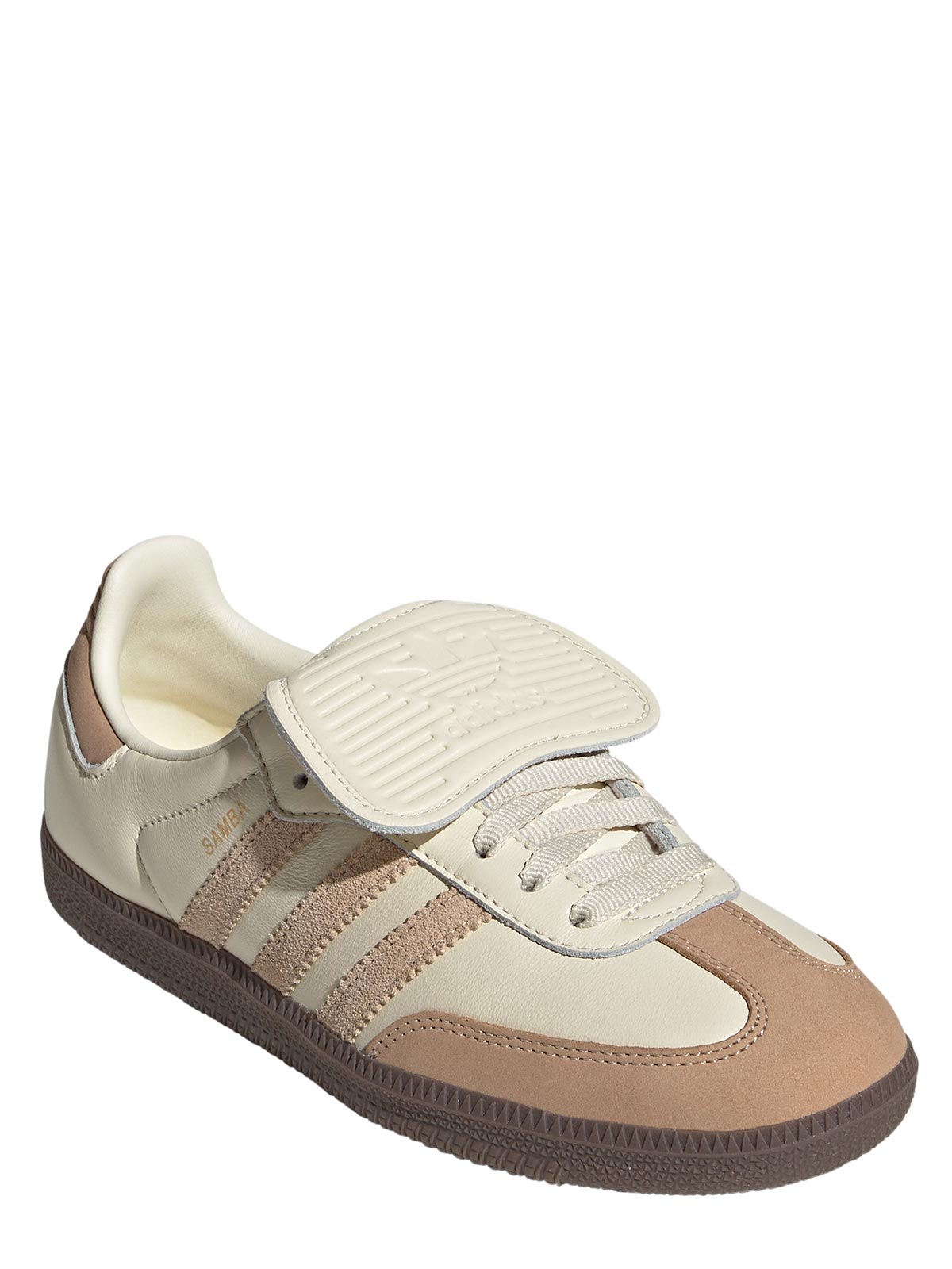 tan and white adidas