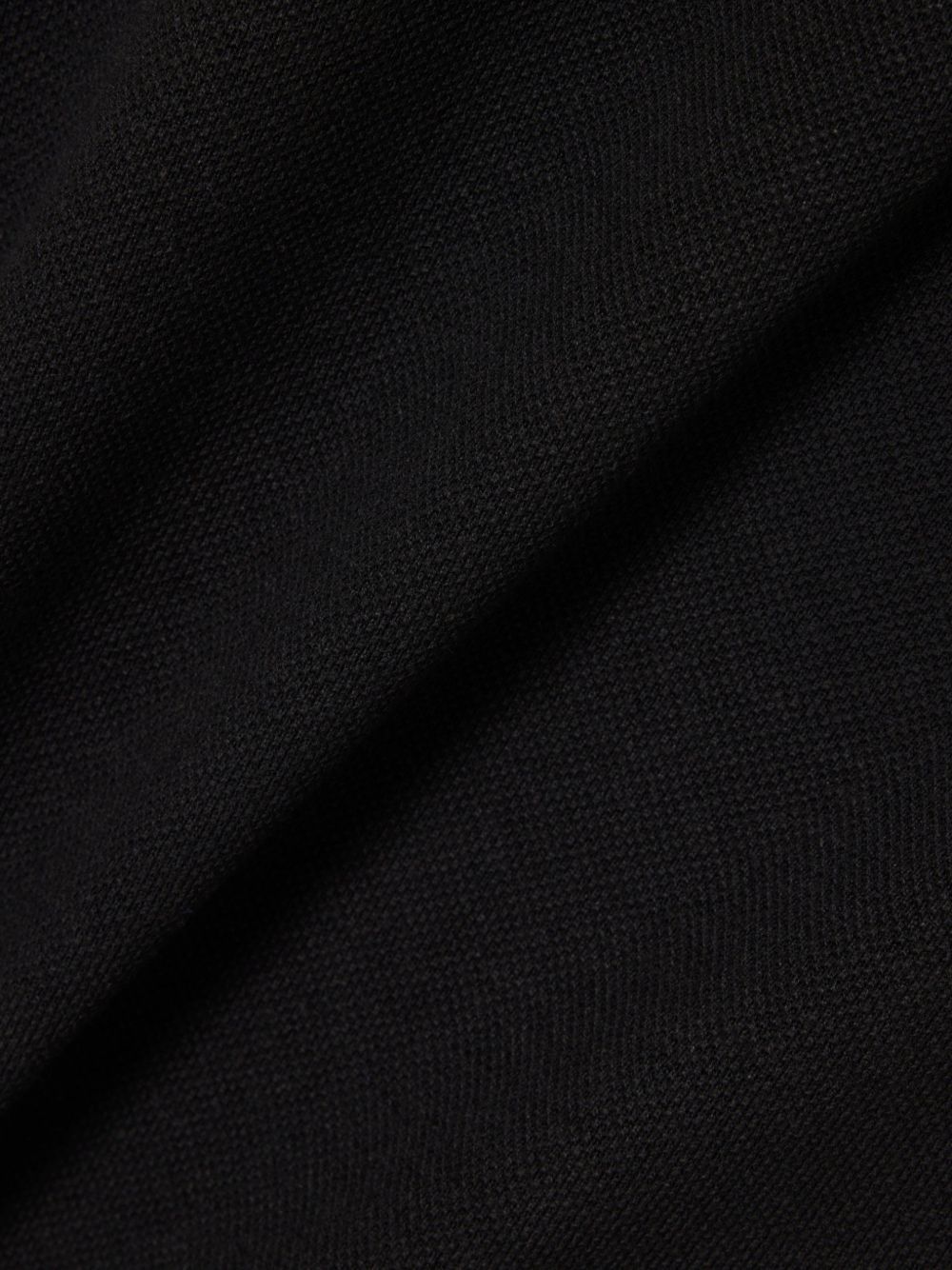Polo nera LACOSTE