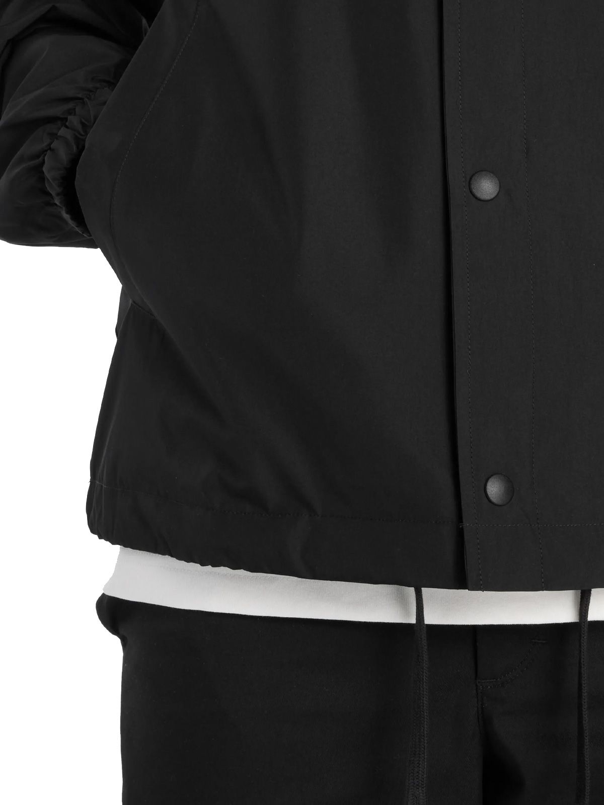 giacca lightweight coaches nera  NEW BALANCE