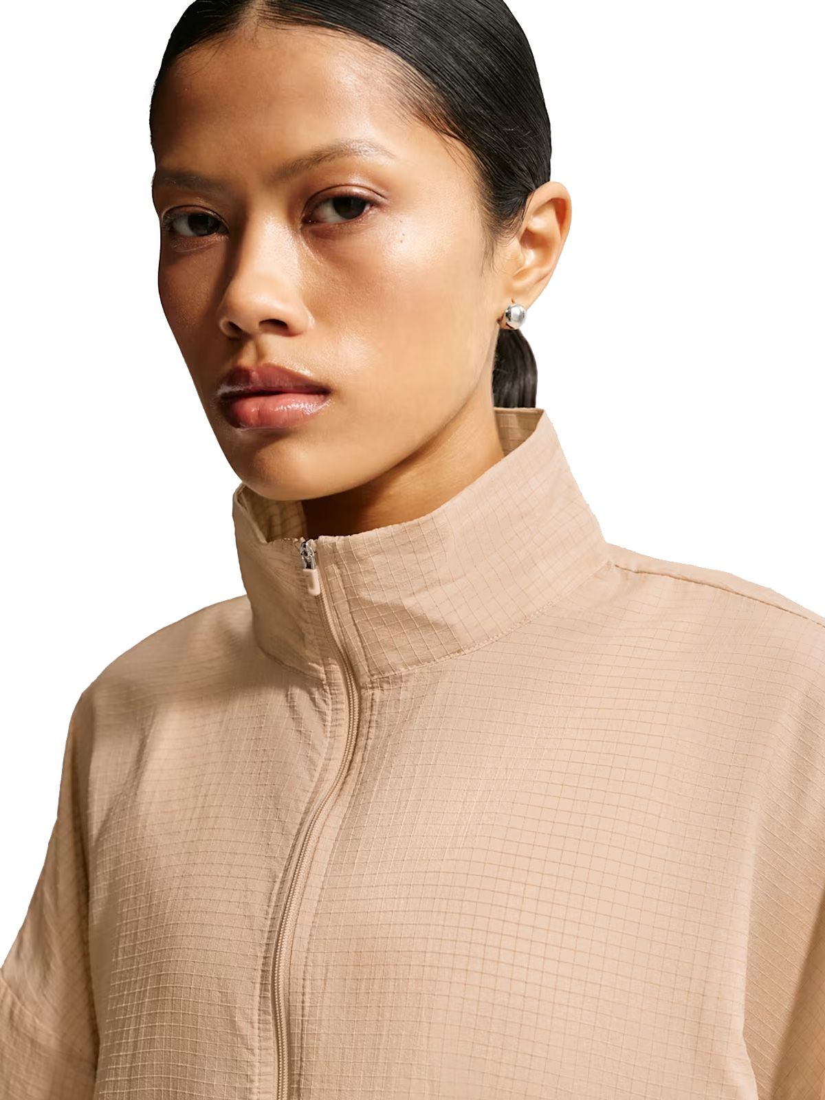 giacca in tessuto antistrappo leggera oversize beige  NIKE